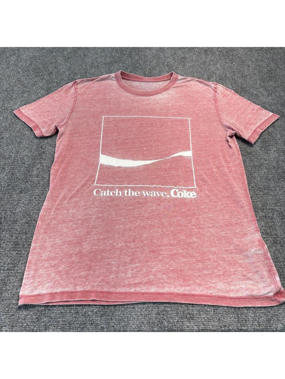 Coca-Cola Catch the Wave T-Shirt with white graphic of a wave